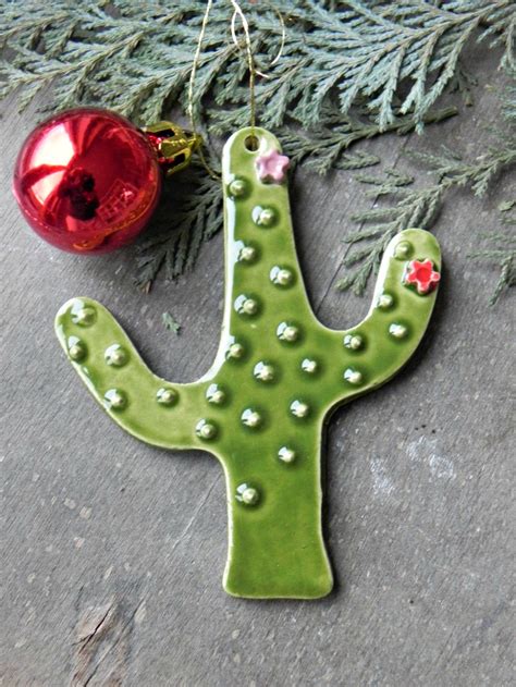 The christmas cactus, formally known as the zygo cactus arrives in bud form, ready to bloom. 2 Cactus Ceramic Christmas Ornaments, Flower Cacti ...