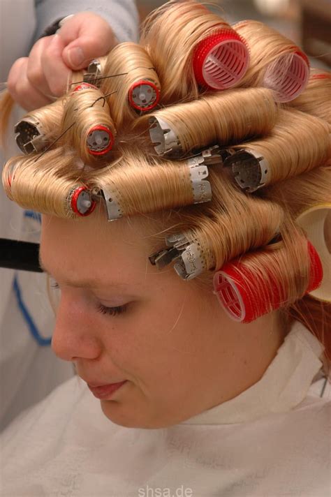 jack sat patiently having his starwaberry blonde hair curled set in rollers for the first time