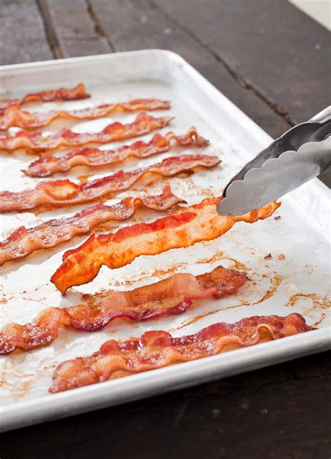 Remove from the oven and let the bacon drain on paper towels before serving. Baked Bacon Recipe | Leite's Culinaria