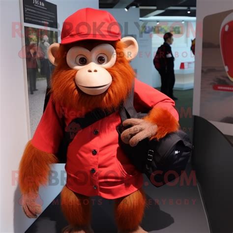 Red Capuchin Monkey Mascot Costume Character Dressed With A Pleated