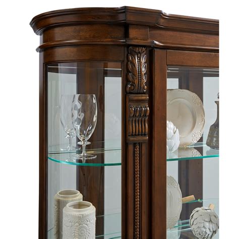 Show off your favorite trophy collection in a. Pulaski Foxcroft Curved End Curio Cabinet - 102003