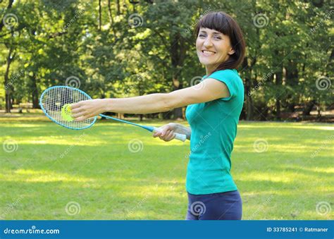Smiling Woman With Badminton Racket In The Summer Park Stock Image