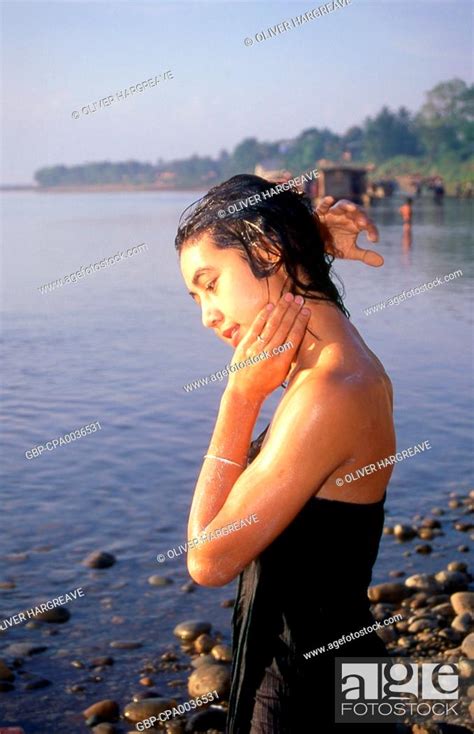Burma Myanmar A Burmese Woman Bathing In The Ayeyarwady Irrawaddy