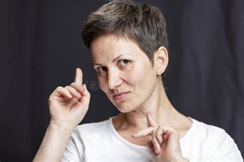 Emotional Portrait Of An Adult Woman With Short Hair And Closed Eyes