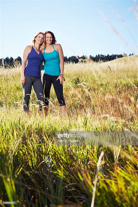 Mature Women Enjoying Sunset On Field Photo Getty Images