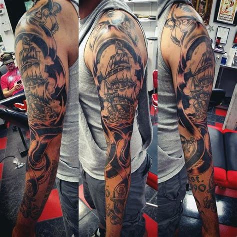 A rib tattoo for the departed carved in black with a soaring eagle carrying a sailor anchor. Awesome nautical images - Part 2 - Tattooimages.biz