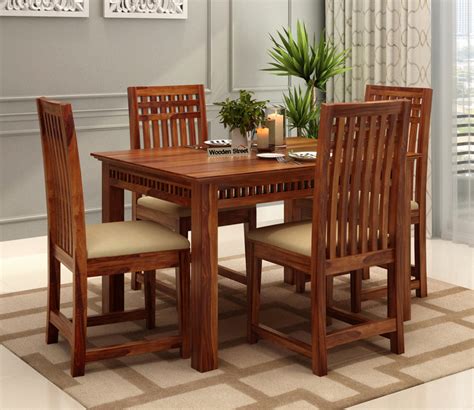 Buy Adolph Compact 4 Seater Dining Table Set With 4 Chairs Honey Finish Online In India At