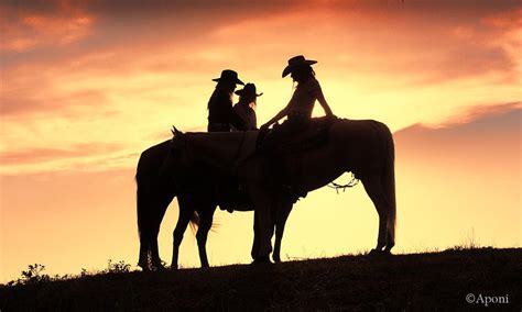 Sunset Cowgirls Photograph By Laurie Harris