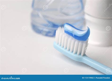 Blue Toothpaste On A Toothbrush On White Background Stock Image Image