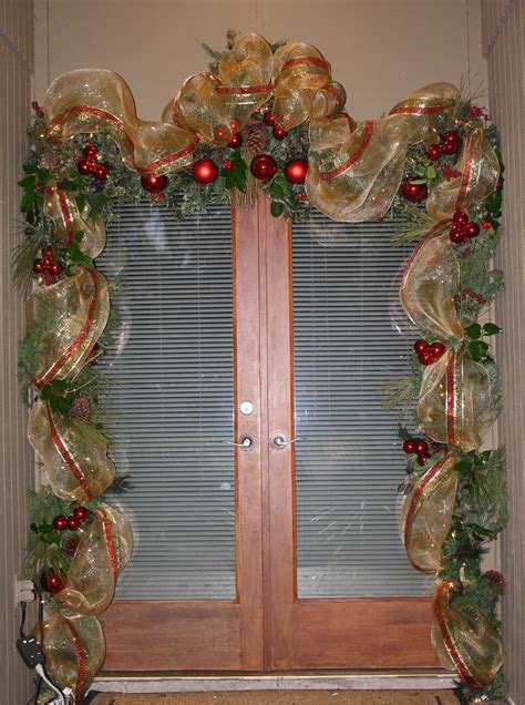 Front Door Garland Using 21 Deco Mesh And Wired Ribbon And Tucking In
