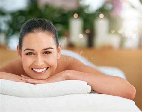 Treat Yourself To A Blissful Day At The Spa Portrait Of An Attractive Young Woman Relaxing On A