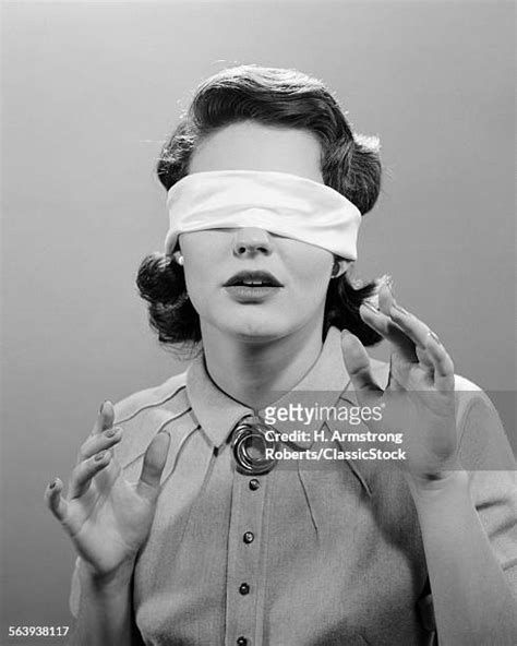 blind folded woman photos and premium high res pictures getty images
