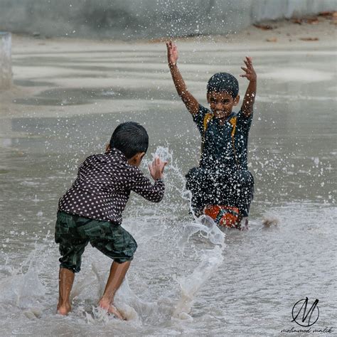 Kids Playing In The Rain On Behance