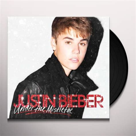 At the age of 13, bieber was discovered by current manager scooter braun on youtube and was signed by american r&b singer usher to rbmg records. Justin Bieber UNDER THE MISTLETOE Vinyl Record