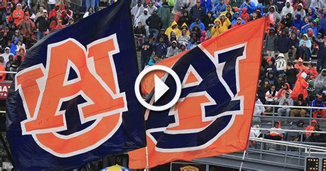 Video Auburn Cheerleader Fails While Running Flag Across End Zone