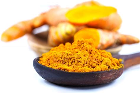 Premium Photo Turmeric Roots And Powder Herb On White Background