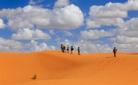 People Walk Of The Sahara Desert Stock Photo Image Of Dune Merzouga