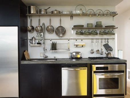 With our rails, hooks, containers and shelves, it's easy to come up with your own kitchen wall storage solution. Kitchen: Open Rail Storage Systems - Remodelista | Kitchen ...