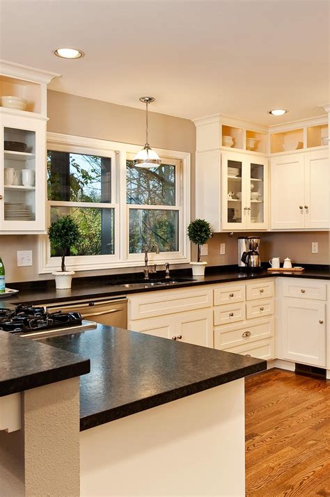 Is a white quartz/quartzite/granite pretty much the same in terms of maintenance when compared with a black/dark granite? 36 Enviable Black Granite Countertop White Cabinets