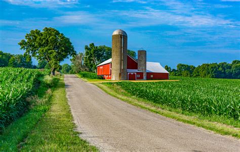 Midwest Farm With Country Road And Red Barn Stock Photo Download