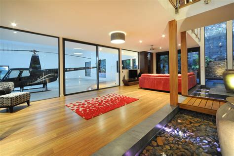 Chris Clout Design Hangar Home In Whitsundays With Helicopter In House
