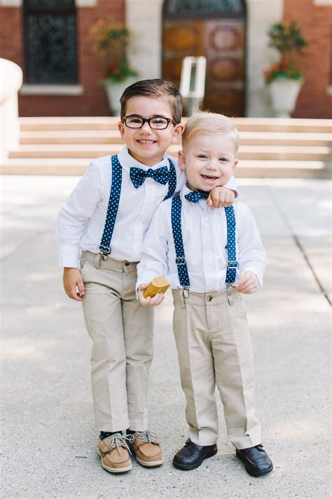 Ring Bearers With Blue Bow Ties And Suspenders