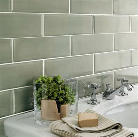 A longer tile in a traditional staggered brick does feel a bit more modern though like in this bathroom by elena calabrese. 32 sage green bathroom tiles ideas and pictures