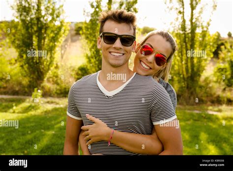 Portrait Of A Happy Young Couple Embraced Stock Photo Alamy