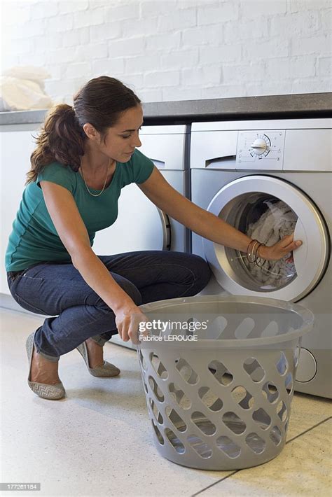 Woman Doing Laundry Photo Getty Images