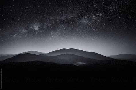 Night Landscape With Stars Over Mountain At Night