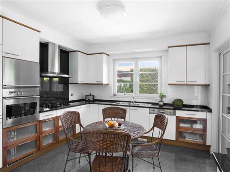 If you're moving into a new home or are looking to renovate an old kitchen, you'll find that our service most important is your kitchen starts with you. White L Shape Modular Kitchen With Dining Space - Magick Woods