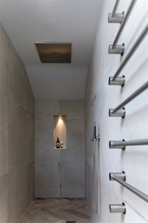 So i have a basement bathroom with concrete walls. Concrete effect tiles & Vola- Contemporary walk in shower ...