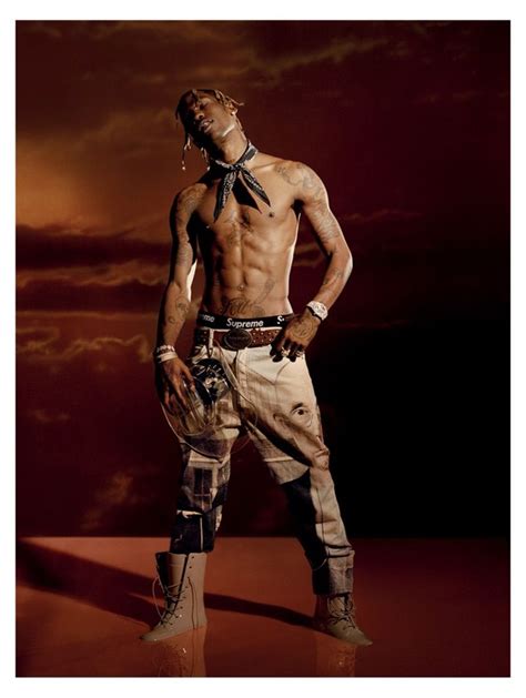 Posing For A New Photo Shoot Travis Scott Goes Shirtless In A Palm Angels Belt And Trousers