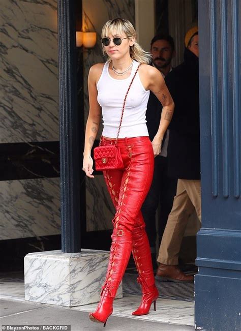 Miley Cyrus Stuns In Red Leather Lace Up Pants And White Tank Top Red