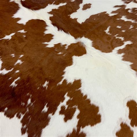 Brown And White Cowhides Superior Quality — Superior Hides
