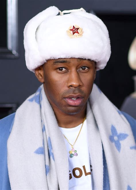 Tyler The Creator Was Hiding Leopard Print Hair Under His Big Fuzzy Hat