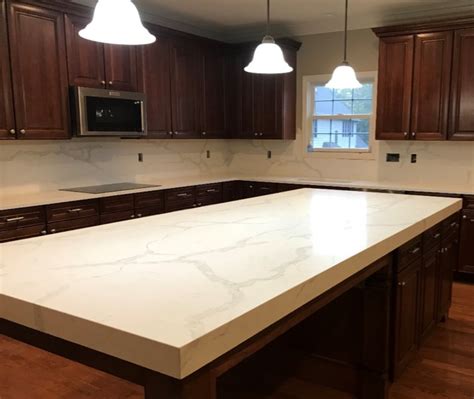 Manufactured using crushed quartz crystals combined if you're considering upgrading your kitchen surfaces , check out our guide to quartz kitchen countertops below to learn about the material's. Calcatta Verona Quartz: A Quartz Countertop that Looks ...