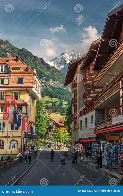 Main Street Of Wengen Village With View Over Mountains In Switzerland
