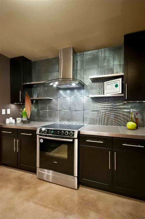 Black stone flooring tiles design for modular kitchen. 2015 Kitchen Ideas with Fascinating Wall Treatment | homyhouse