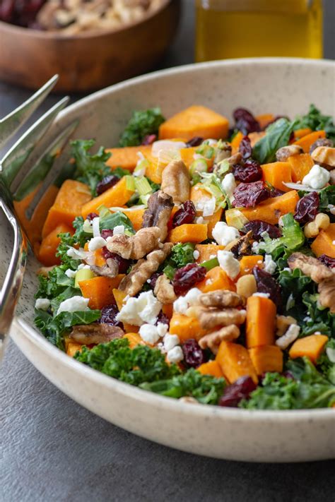Sweet Potato Kale Salad With Cranberries Walnuts And Goat Cheese