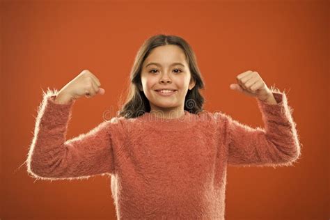 Child Cute Girl Show Biceps Gesture Of Power And Strength Feel So