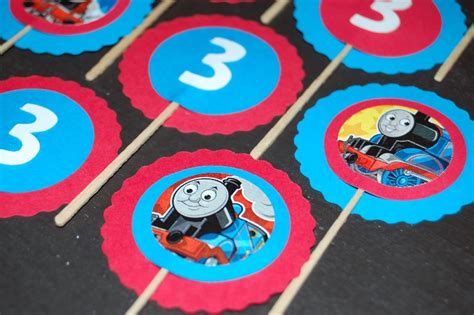 Check spelling or type a new query. Thomas Cupcake Toppers
