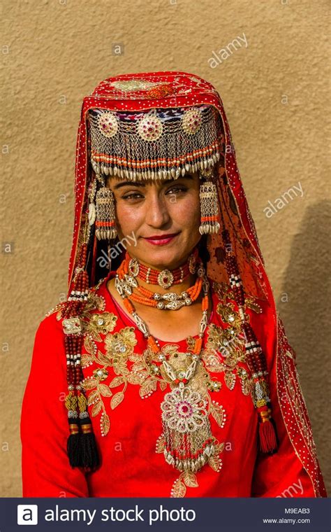 A Tajik minority woman in traditional clothing in Taxkorgan
