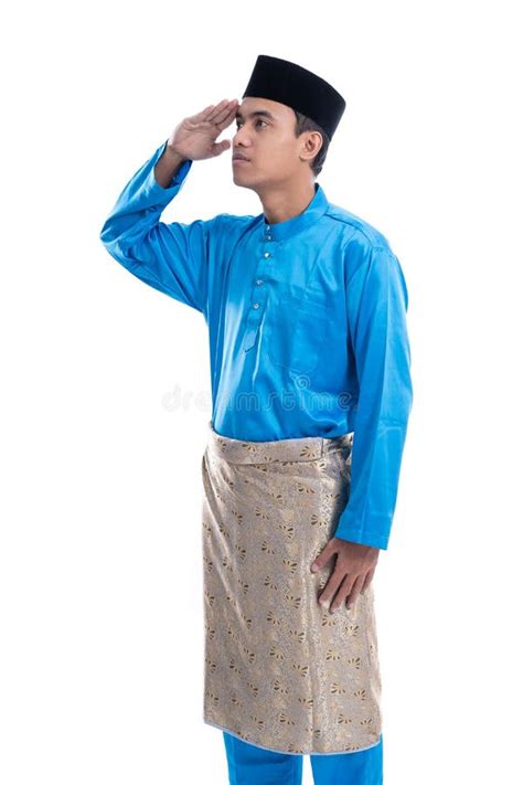 Malaysian Male With Salute Gesture Over White Background Stock Photo