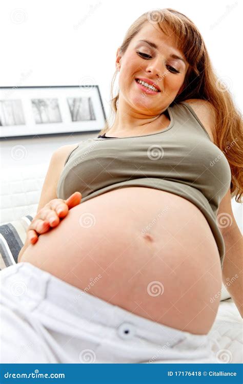 Happy Pregnant Woman Holding Her Belly Close Up Stock Photo Image