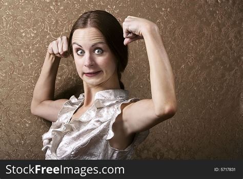 Young Woman Flexing Her Biceps Free Stock Images And Photos 5717831