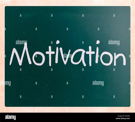 Motivation Handwritten With White Chalk On A Blackboard Stock Photo Alamy