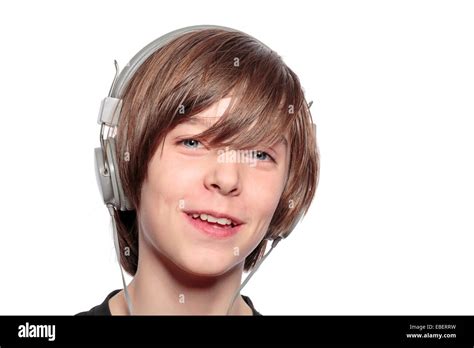 Smiling Teenage Boy With Headphones Isolated On White Stock Photo Alamy