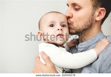 Young Happy Father Kissing Baby Hands Stock Photo 264030578 Shutterstock