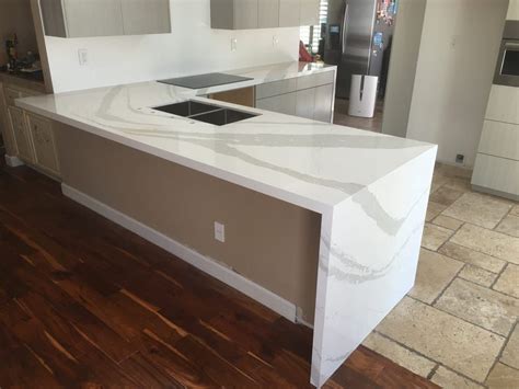 Cambria quartz countertops are coveted for their beauty, durability, and commitment to environmental sustainability. Beautiful kitchen done with Brittanica Cambria Quartz ...